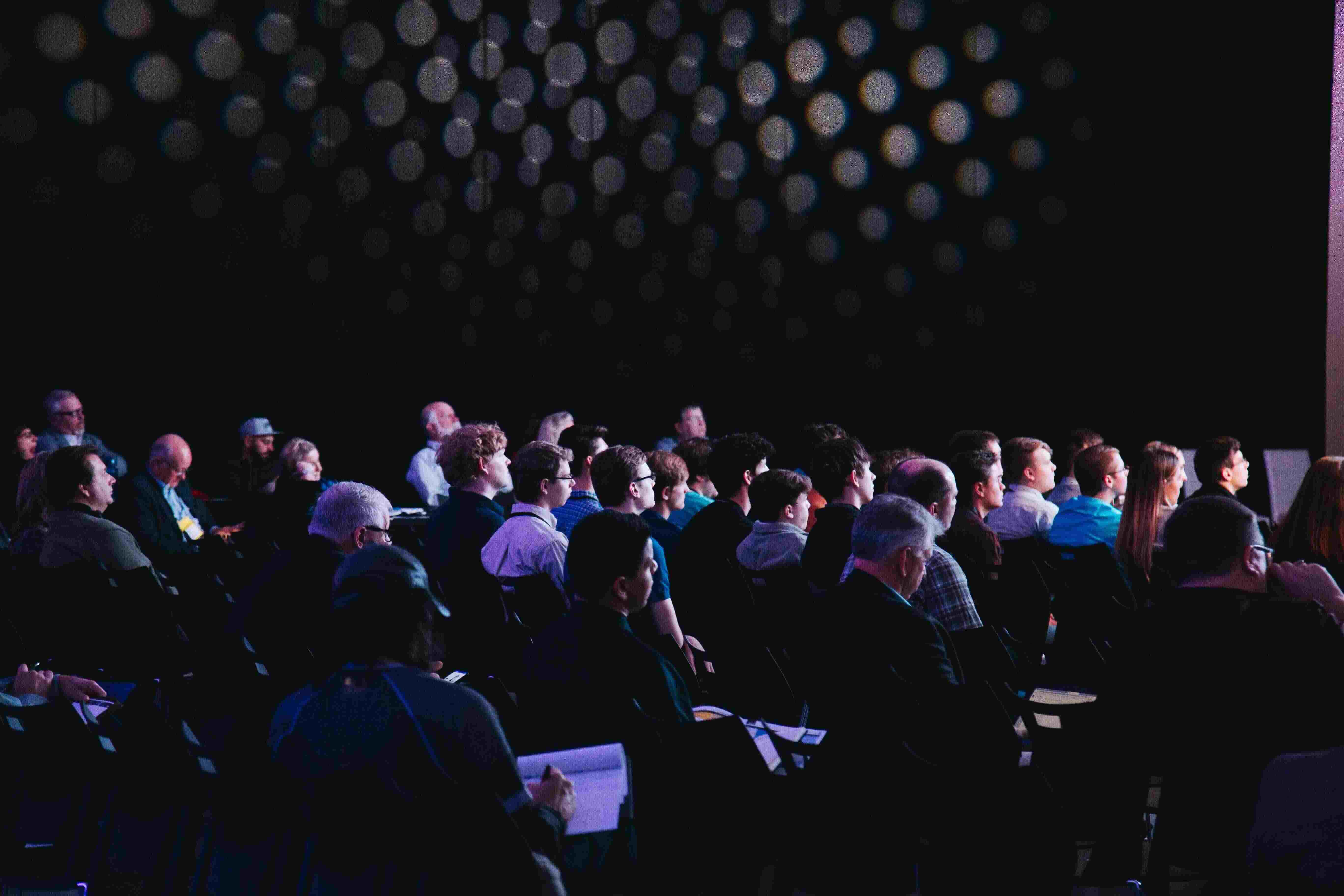 An image of an audience at a conference.