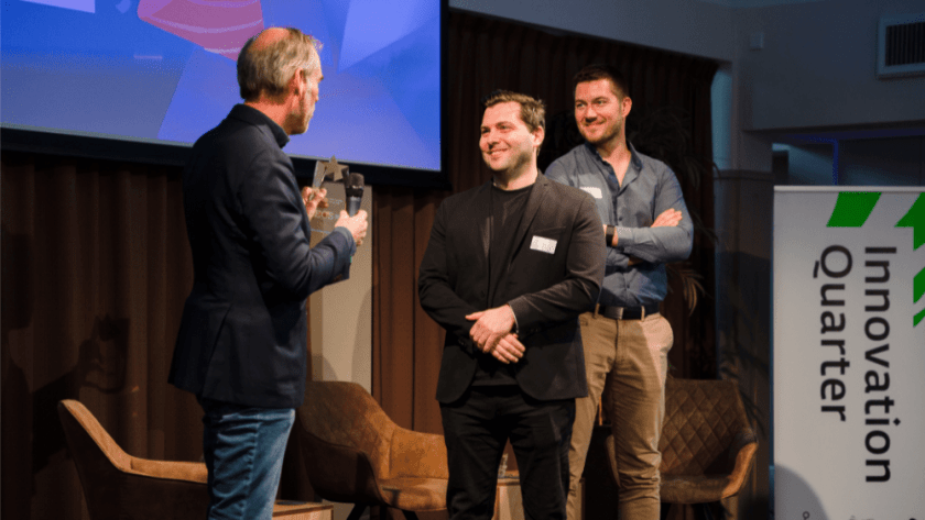 An image from the 2021 European Cybersecurity STARtup Award event. Three men on stage.