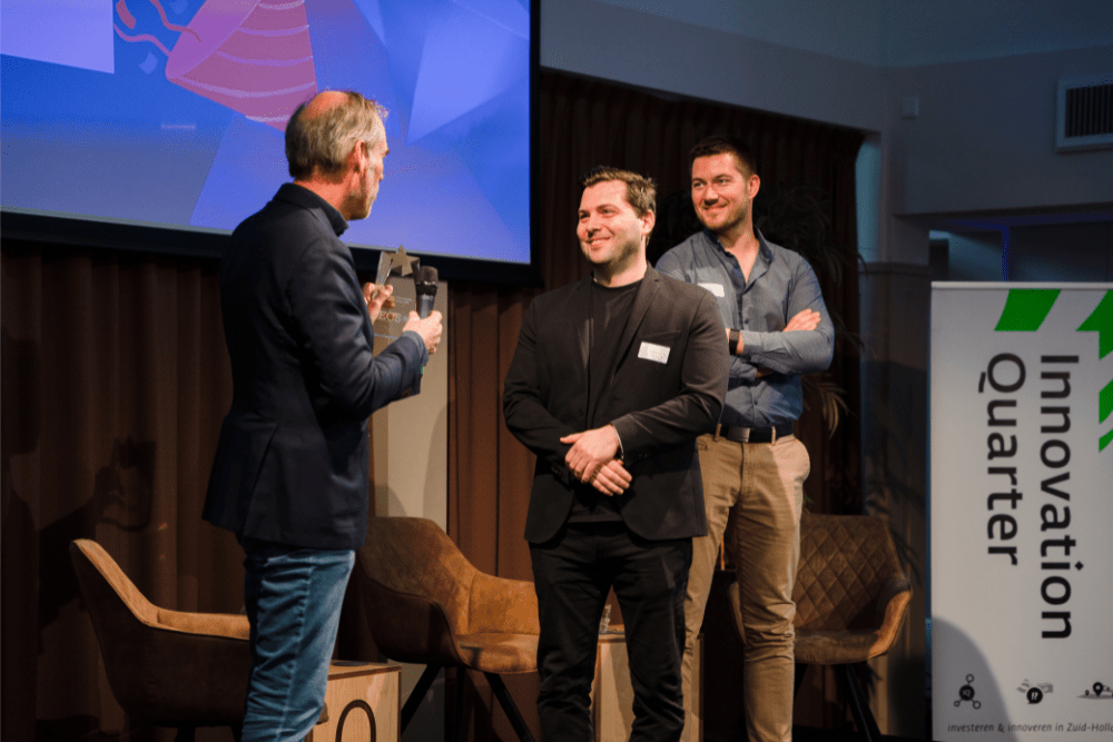 An image from the 2021 European Cybersecurity STARtup Award event. Three men on stage.